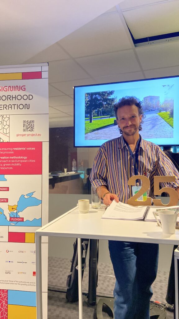 Théo Schuhmacher behind the GINNGER stand at EUSEW 2025 Energy Fair